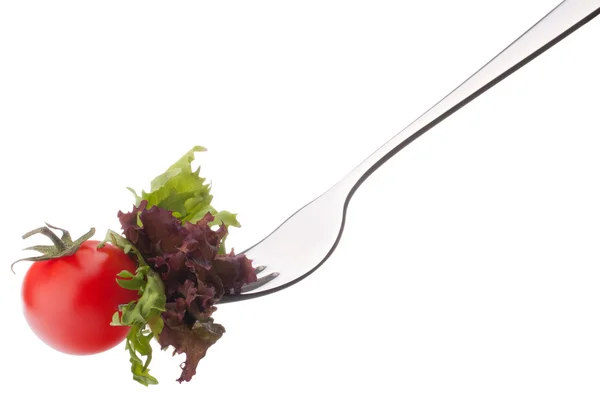 Fresh salad and cherry tomato on fork — Stock Photo, Image