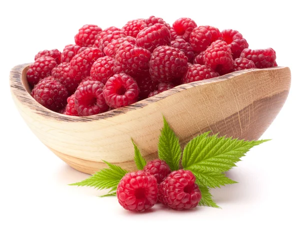 Raspberries in wooden bowl — Stock Photo, Image