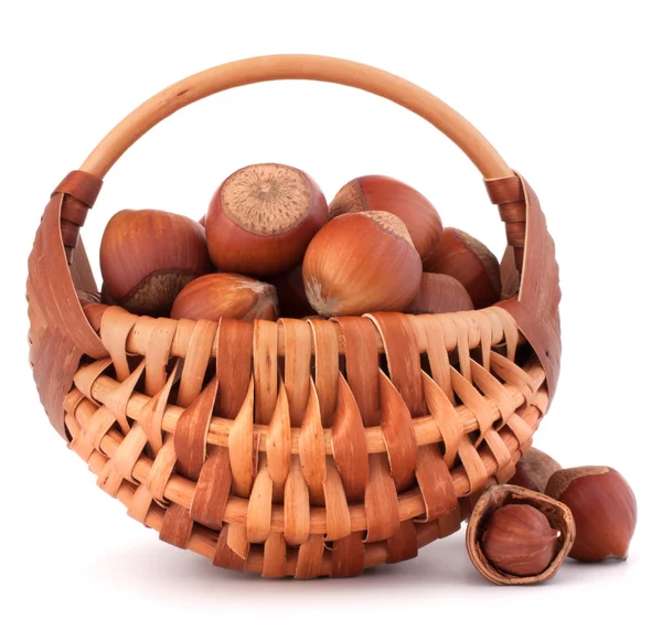 Hazelnuts in wicker basket — Stock Photo, Image