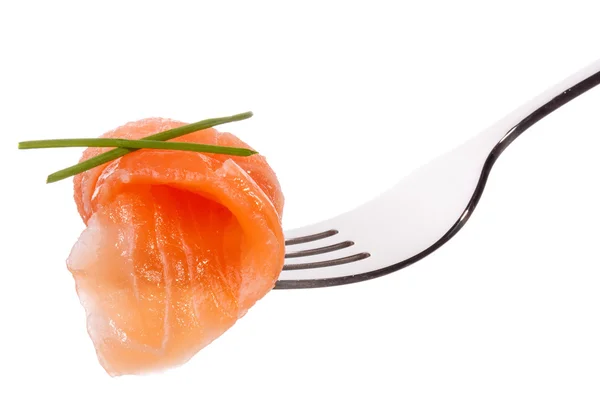 Salmon piece on fork — Stock Photo, Image