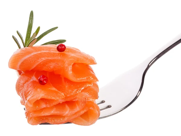 Salmon piece on fork — Stock Photo, Image