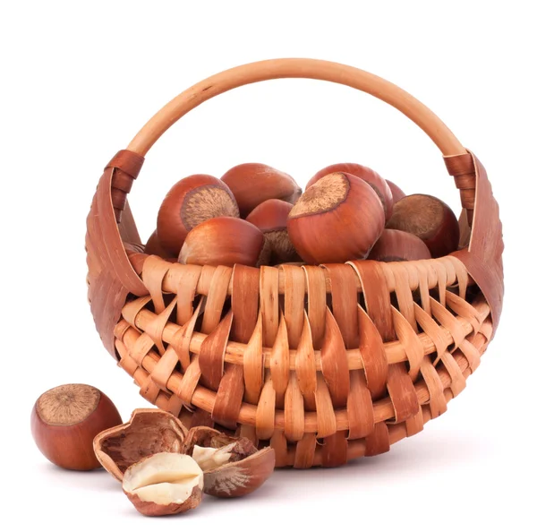 Hazelnuts in wicker basket — Stock Photo, Image