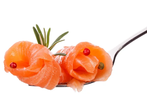 Salmon pieces on fork — Stock Photo, Image
