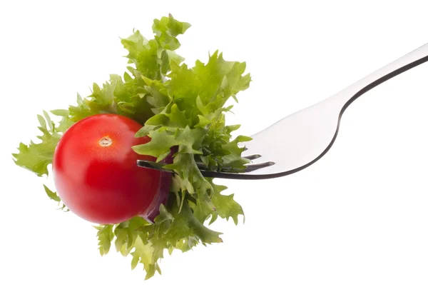 Fresh salad and cherry tomato on fork — Stock Photo, Image