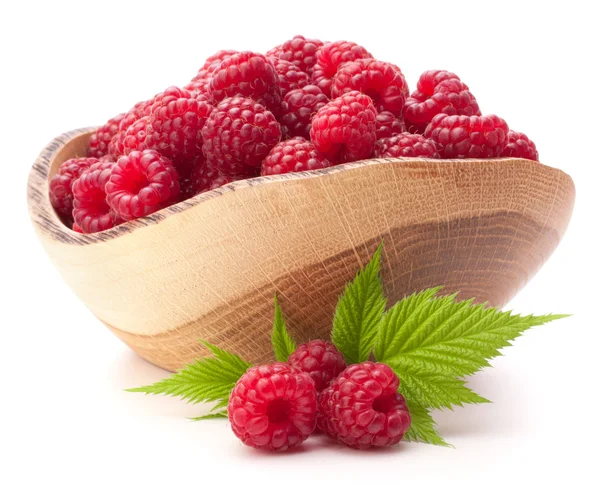 Raspberries in wooden bowl — Stock Photo, Image