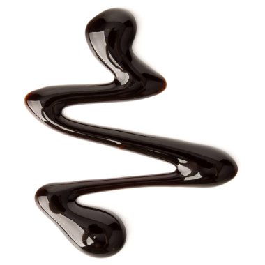 Çikolata şurubu izole üzerinde beyaz arka plan damla. Üstten Görünüm.