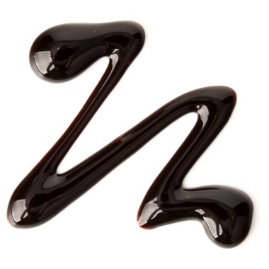 Çikolata şurubu izole üzerinde beyaz arka plan damla. Üstten Görünüm.