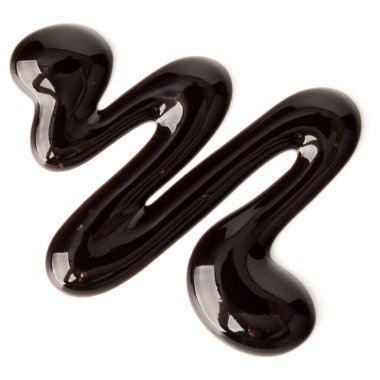 Çikolata şurubu izole üzerinde beyaz arka plan damla. Üstten Görünüm.