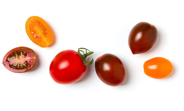 Vários Tomates Coloridos Isolados Fundo Branco Vista Superior Deitado Plano — Fotografia de Stock