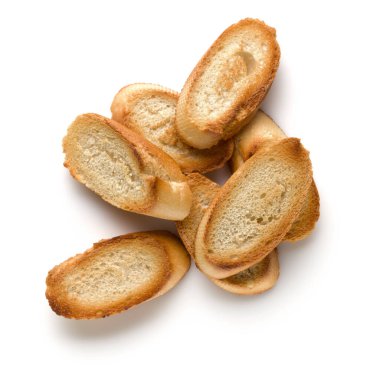 Beyaz arka plan üzerinde izole tost baget dilimleri kapatın. Tost, kızarmış ekmek parçaları. Üstten görünüm.