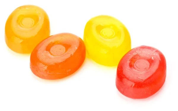Quattro Caramelle Zucchero Duro Frutta Colorata Dolci Bolliti Prugne Isolate — Foto Stock