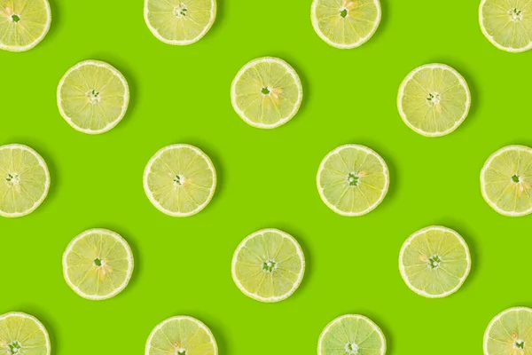 Fruit Pattern Lemon Slices Green Background Flat Lay Top View — Stock Photo, Image