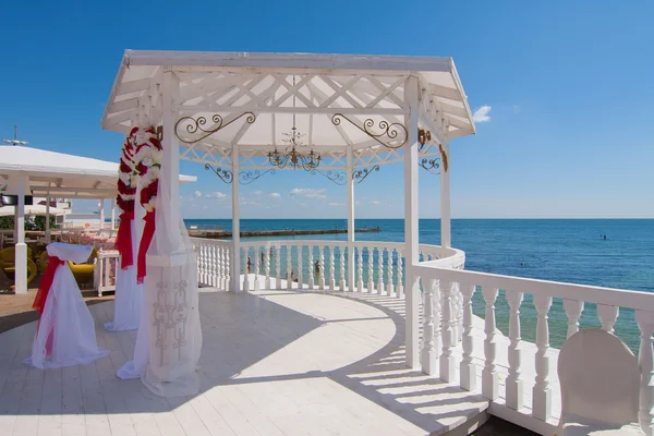 White wedding pavilion on the beach with arch — Stock Photo, Image