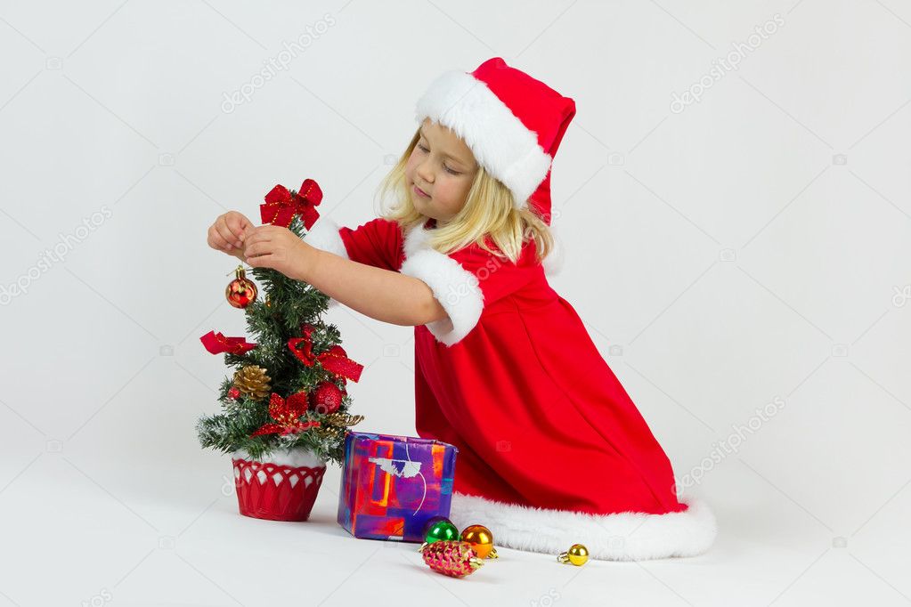 Girl in a red Christmas costume