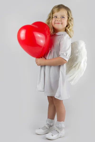 Ángel con corazón rojo — Foto de Stock