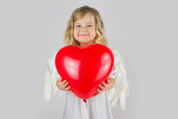 Angel withred hart — Stockfoto