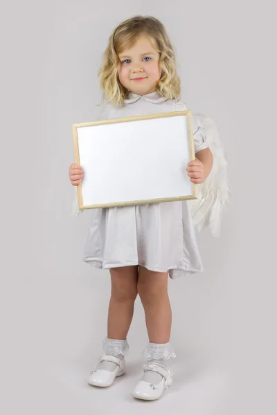 Anjo com placa branca em branco — Fotografia de Stock