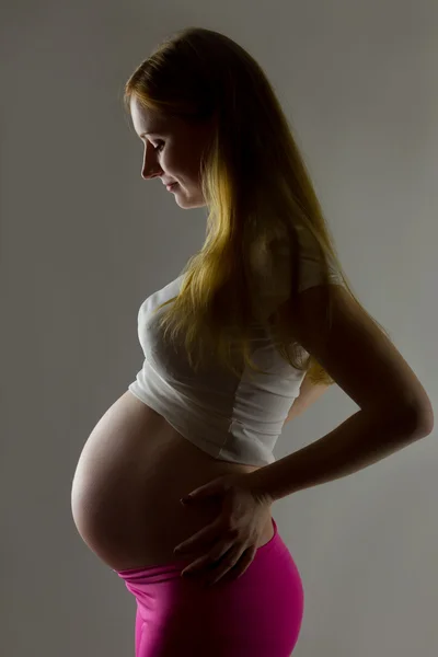 Profil för gravid kvinna — Stockfoto