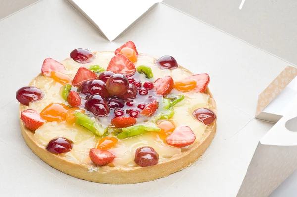 Fruit cake in a box — Stock Photo, Image