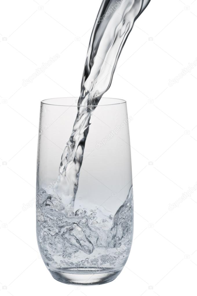 Water stream being poured into a glass