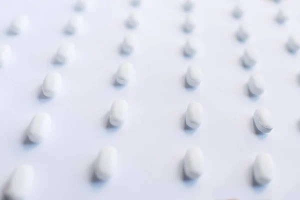 Viele Weiße Pillen Auf Weißem Hintergrund Gesundheit — Stockfoto