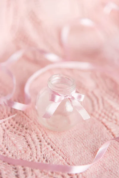 Small Glass Bottle Ribbons Gentle Pink Background Card — Stockfoto