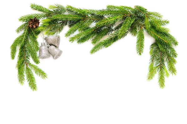 Christmas Decorations Fir Branches Silver Toy Balls Bells Isolated — Stockfoto