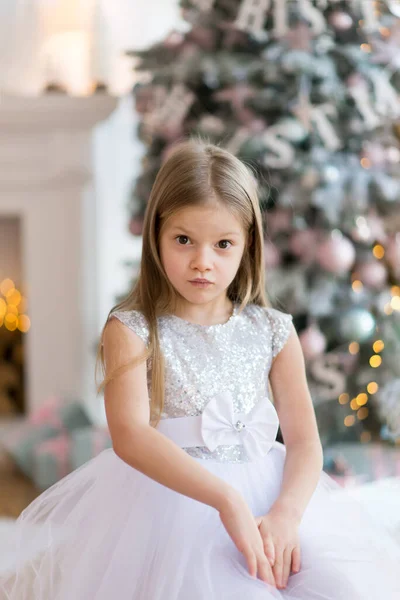 Little Girl Dressed Beautiful Fashionable White Dress Poses Christmas Tree — Stock Fotó