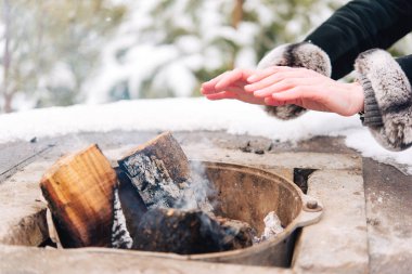 Firewood. Winter fire in a specially equipped place. You can warm up.