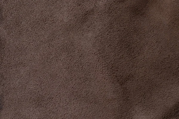ダークブラウンの割れた革の質感の背景 — ストック写真