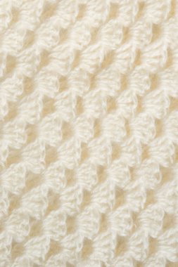 White knitted texture of woolen wool