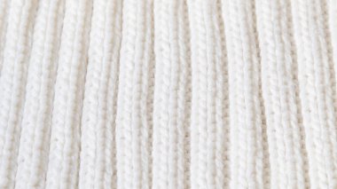 White knitted texture of woolen wool