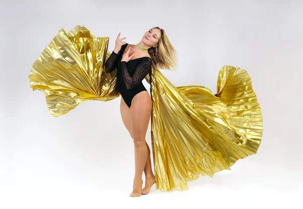 Dançarino com asas douradas Fotografia De Stock