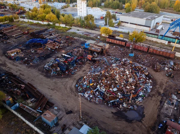 Metal recycling industry. Drone aerial view of scrap yard.