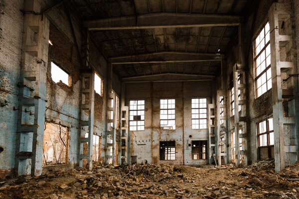 Old abandoned large industrial hall waiting for demolition.