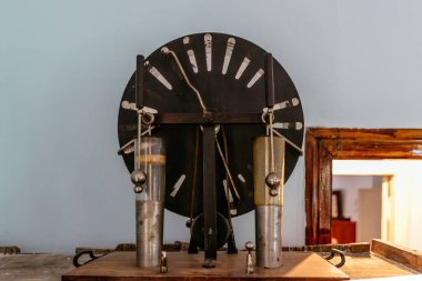 Old electrostatic machine, Wimshurst generator in abandoned school. clipart