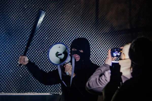Masked Rebel Bat Megaphone Journalists Making Pictires — Stock Photo, Image