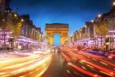 Arc de triomphe paris města při západu slunce - oblouku triumf a champs elysees