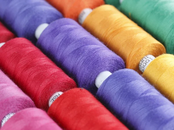 Sewing threads multicolored background — Stock Photo, Image