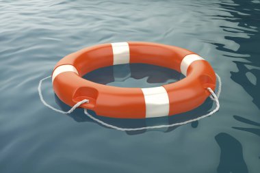 Orange lifebuoy ring floating on sea