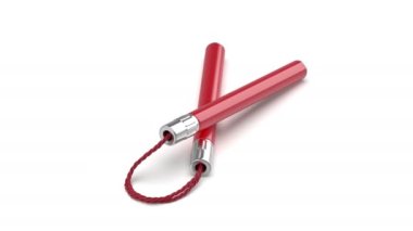 Red nunchaku with cord on white background