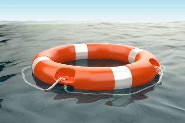 Orange lifebuoy ring in the ocean