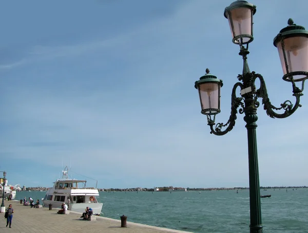 Lantern at embankment in Venice (Italy) Royalty Free Stock Images