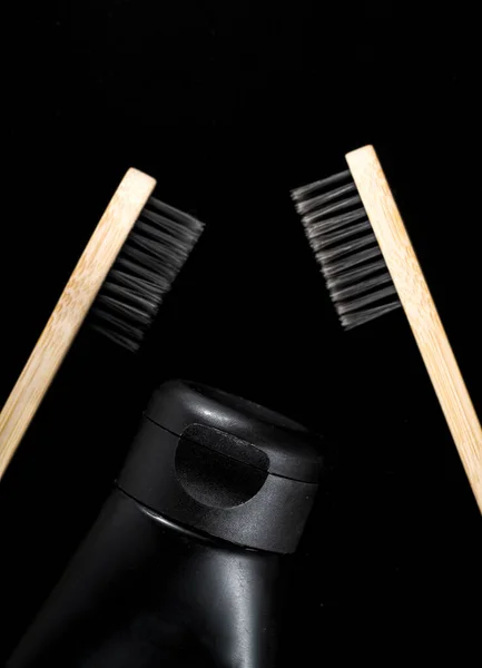 Two Eco Natural Bamboo Toothbrushes Black Frame Black Background — Stock Photo, Image