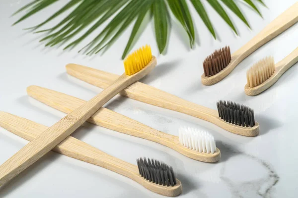 Multi Colored Bamboo Toothbrushes Lie Gray Background — Stock Photo, Image