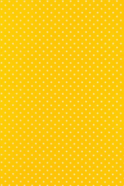 white spots on a yellow background