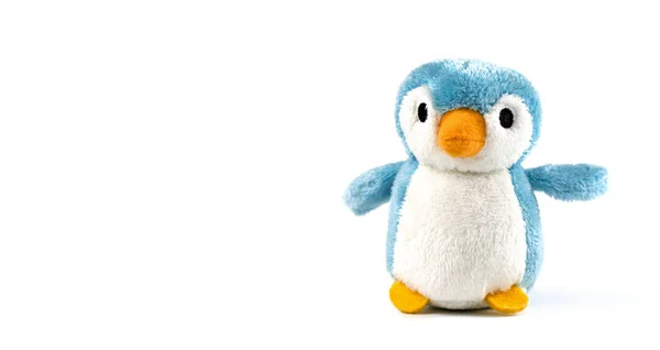 plush penguin on a white background
