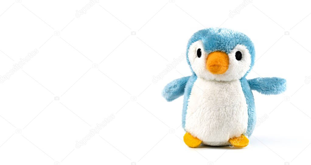 plush penguin on a white background