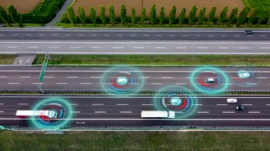 Aerial view of Self Driving Autonomous Cars with HUD-Elements on Highway. Futuristic Intelligent Traffic Detection System. Concept of Smart Transportation.