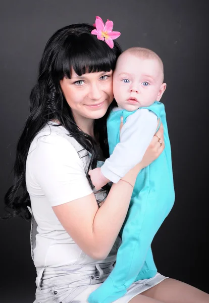 Attractive Woman with newborn baby — Stock Photo, Image